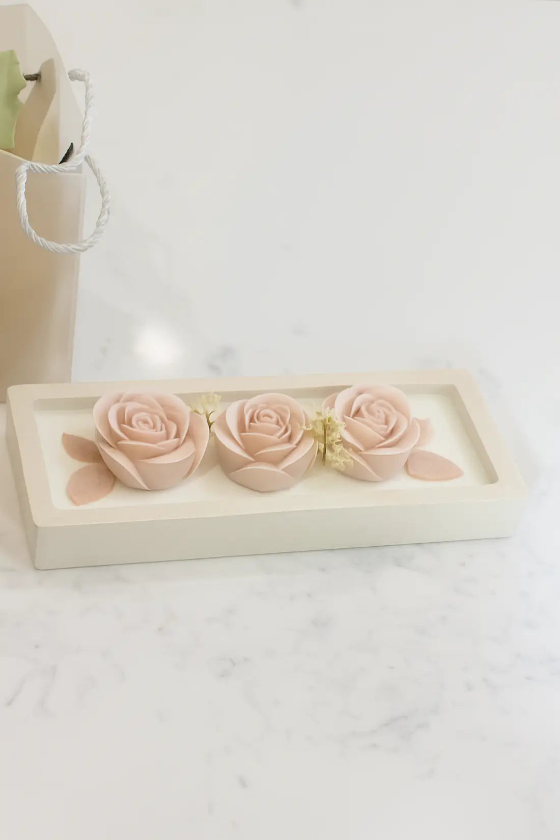 Bloomea Rose Candle displayed with gift-ready eco packaging and soft floral décor.ZENGLOW 