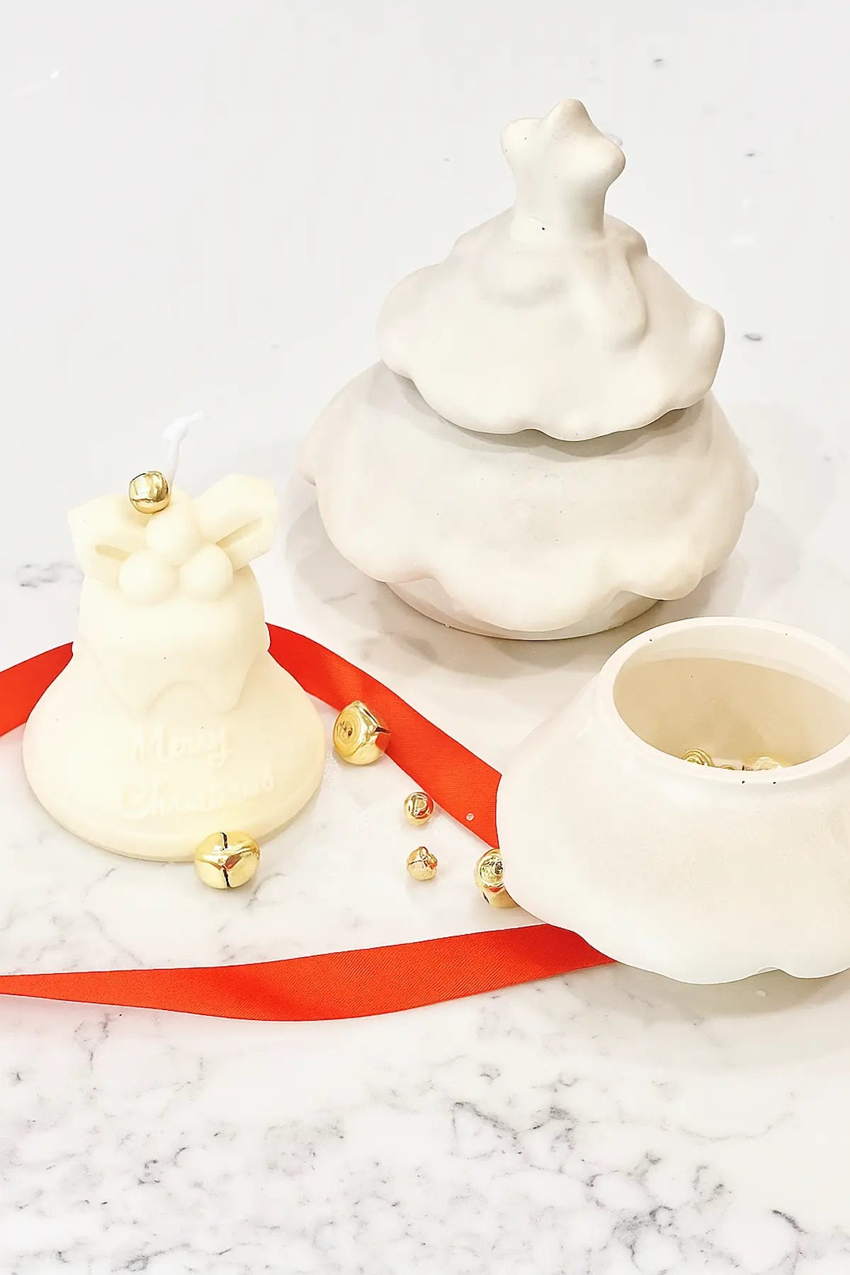 Christmas Bell Candle — hand-poured festive bell-shaped candle.