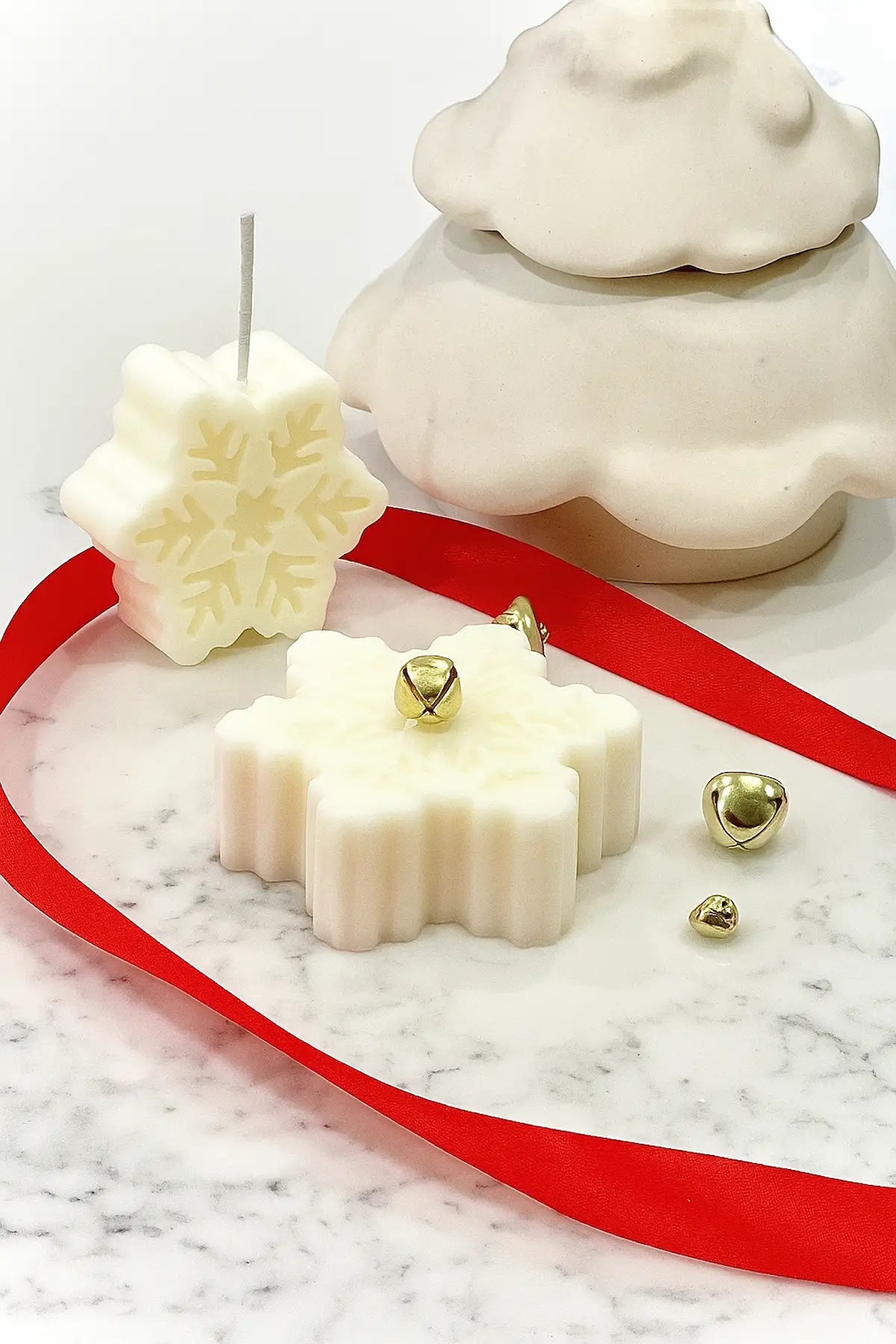 Christmas Snowflake Candle — hand-poured soy candle shaped like a snowflake