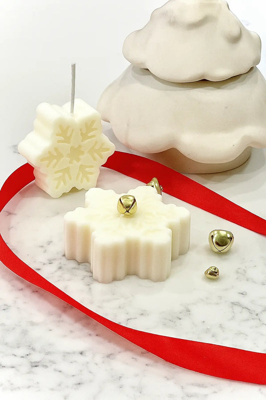 Christmas Snowflake Candle — hand-poured soy candle shaped like a snowflake