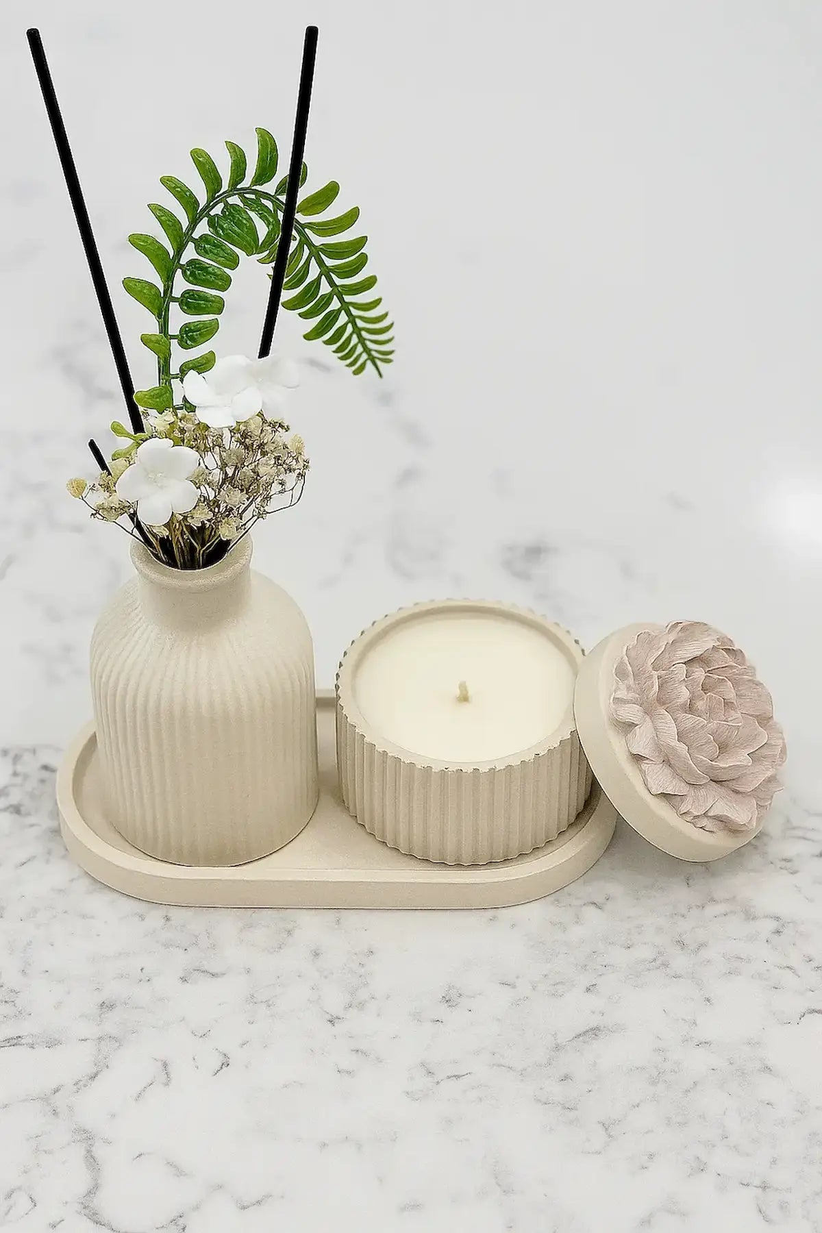 Rosina Set-Bundle with hand-poured floral candle, Moroccan vase, and ceramic tray arranged together.Zenglow 