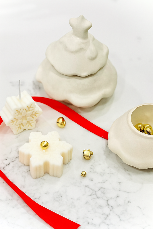 Small Snowflake Candle — mini festive snowflake shaped candle.