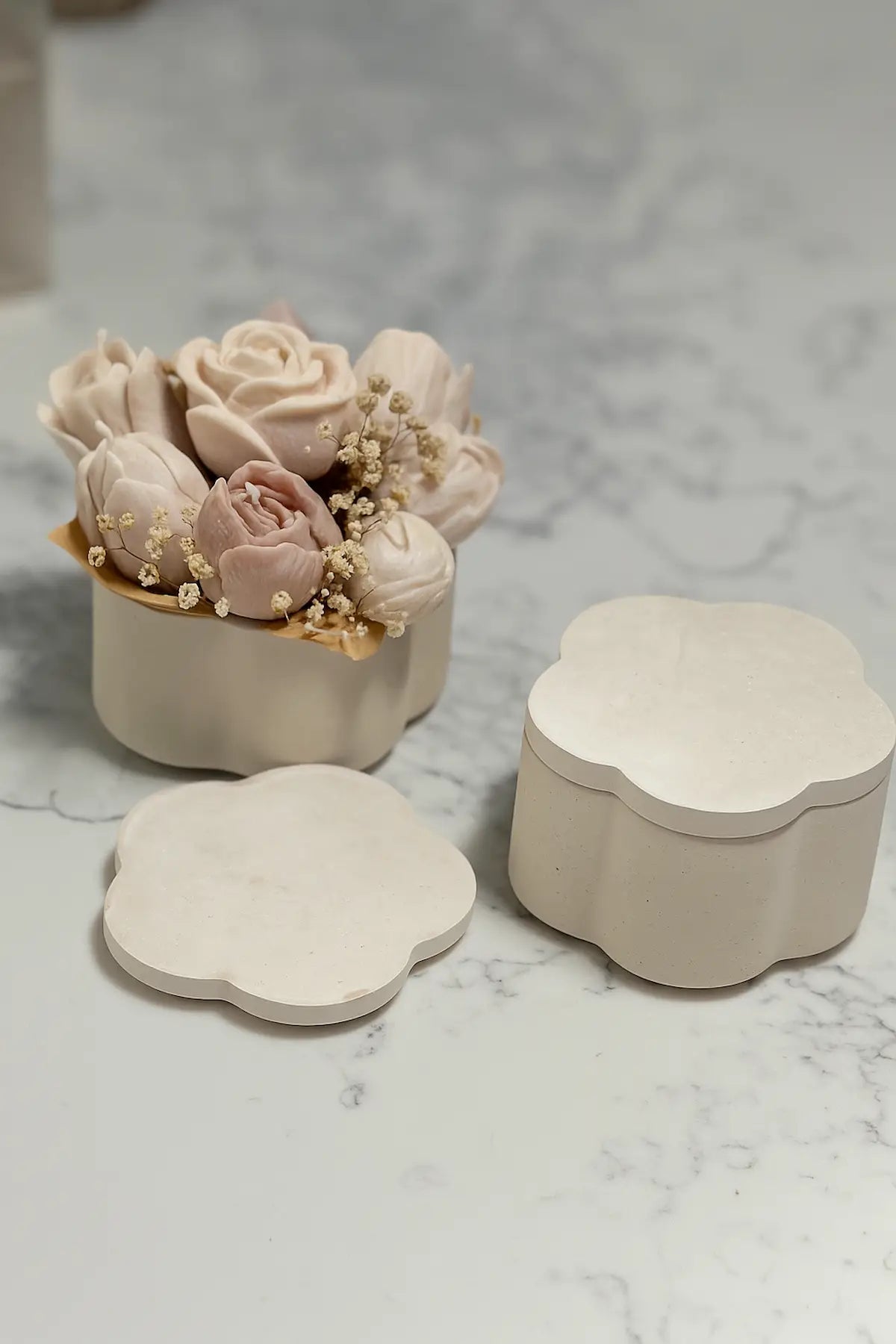 Detail view of Bloomea Classic Candle showing floral top and natural wax texture.Zenglow 